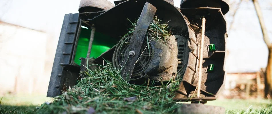 A clogged mower on a lawn in Carmel, IN.