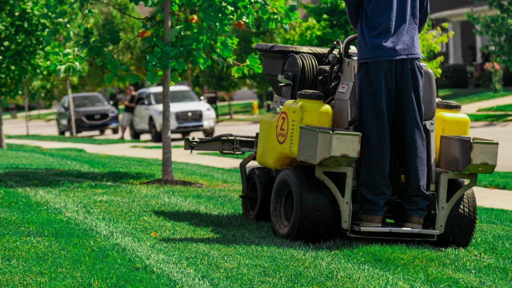 Is It Possible to Overfertilize Your Lawn During the Spring Season? banner-man-fertilizing-a-lawn-with-machine